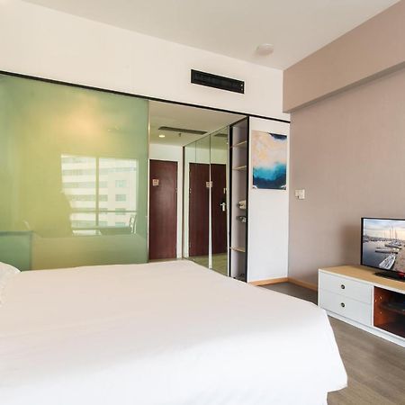 ชิงเตา จินซาน วี ฮอลิเดย์ อพาร์ตเมนต์ โอลิมปิก เซลลิง เซ็นเตอร์ Apartment ชิงเต่า ภายนอก รูปภาพ