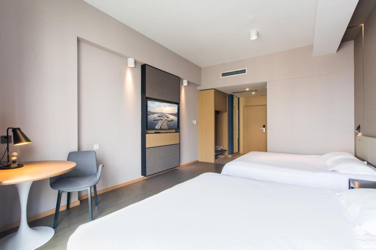 ชิงเตา จินซาน วี ฮอลิเดย์ อพาร์ตเมนต์ โอลิมปิก เซลลิง เซ็นเตอร์ Apartment ชิงเต่า ภายนอก รูปภาพ
