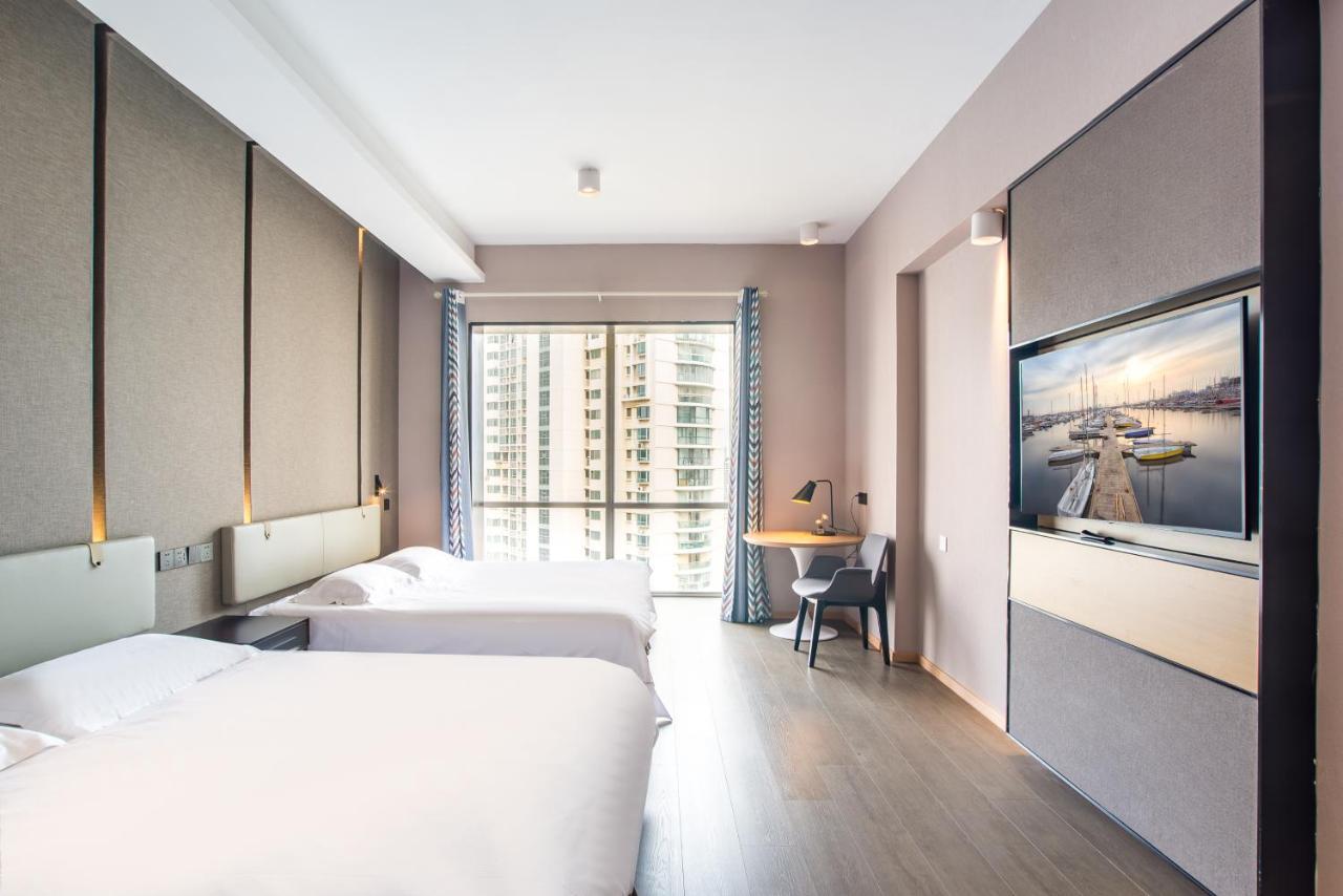 ชิงเตา จินซาน วี ฮอลิเดย์ อพาร์ตเมนต์ โอลิมปิก เซลลิง เซ็นเตอร์ Apartment ชิงเต่า ภายนอก รูปภาพ