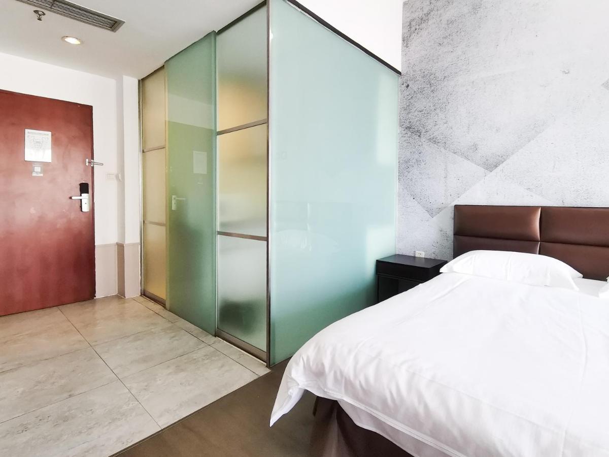 ชิงเตา จินซาน วี ฮอลิเดย์ อพาร์ตเมนต์ โอลิมปิก เซลลิง เซ็นเตอร์ Apartment ชิงเต่า ภายนอก รูปภาพ