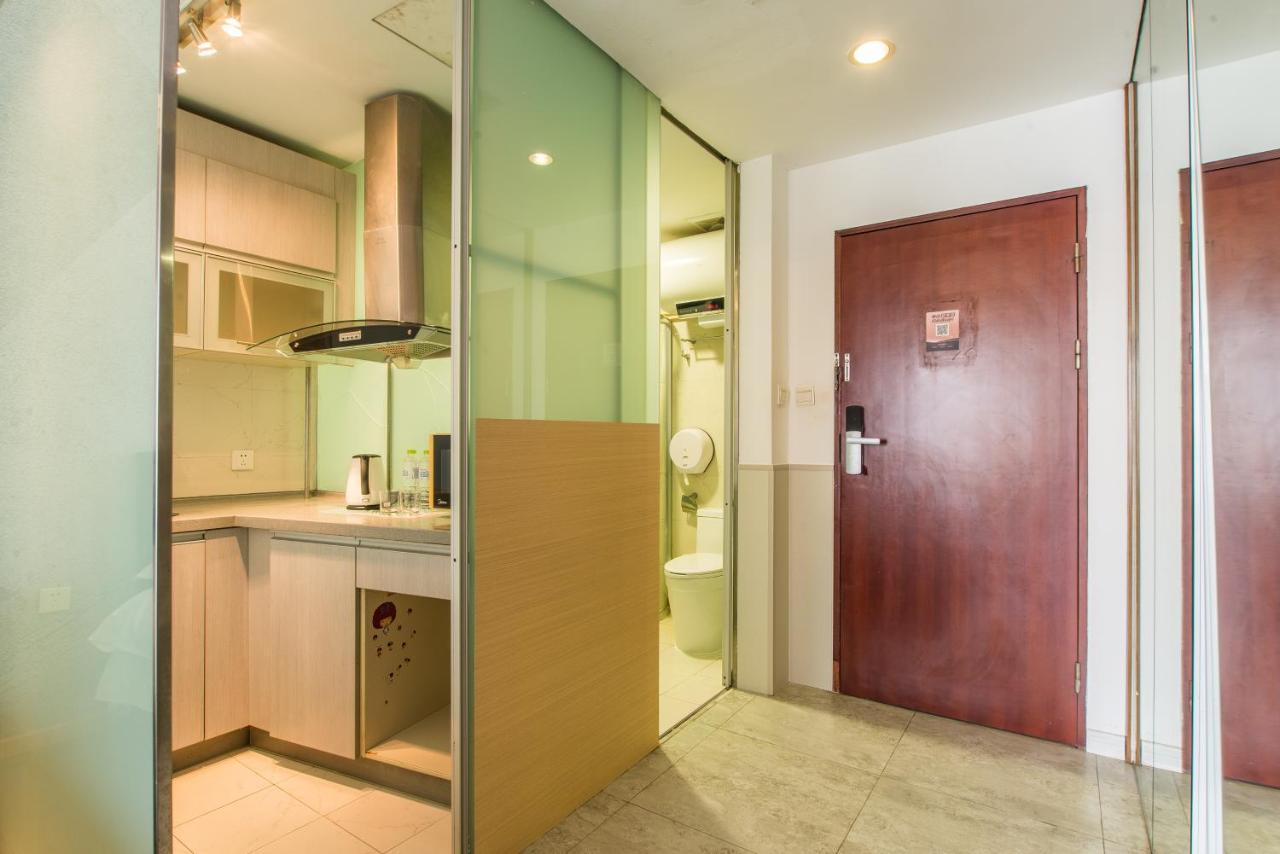 ชิงเตา จินซาน วี ฮอลิเดย์ อพาร์ตเมนต์ โอลิมปิก เซลลิง เซ็นเตอร์ Apartment ชิงเต่า ภายนอก รูปภาพ