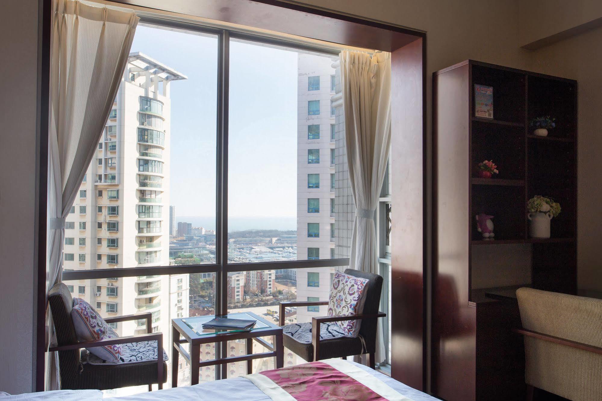 ชิงเตา จินซาน วี ฮอลิเดย์ อพาร์ตเมนต์ โอลิมปิก เซลลิง เซ็นเตอร์ Apartment ชิงเต่า ภายนอก รูปภาพ