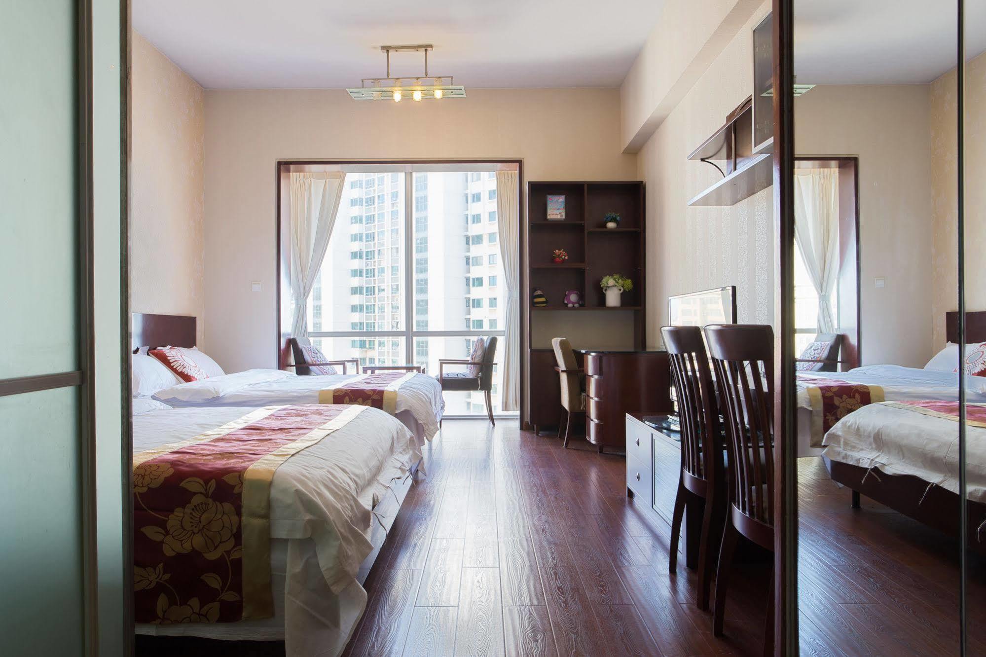 ชิงเตา จินซาน วี ฮอลิเดย์ อพาร์ตเมนต์ โอลิมปิก เซลลิง เซ็นเตอร์ Apartment ชิงเต่า ภายนอก รูปภาพ