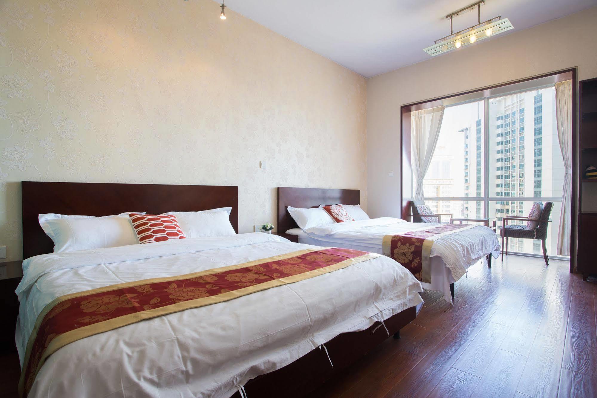 ชิงเตา จินซาน วี ฮอลิเดย์ อพาร์ตเมนต์ โอลิมปิก เซลลิง เซ็นเตอร์ Apartment ชิงเต่า ภายนอก รูปภาพ